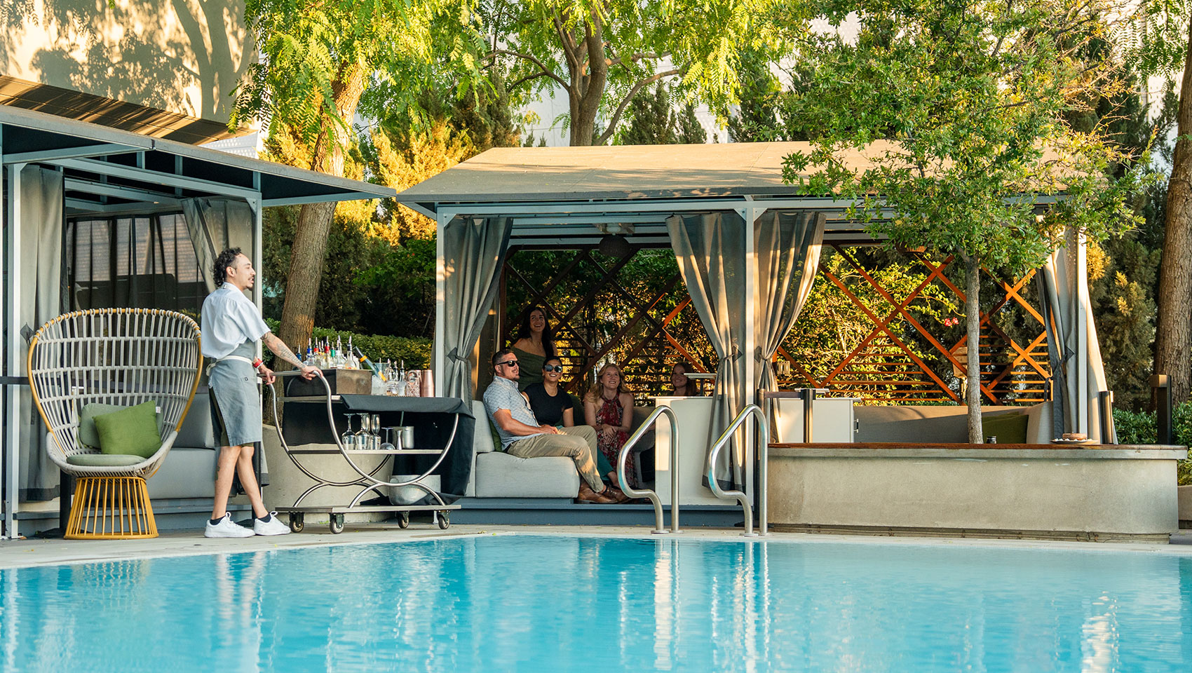 Guests in cabanas at kimpton sawyer hotel