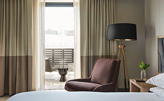 hotel guestroom bedroom balcony